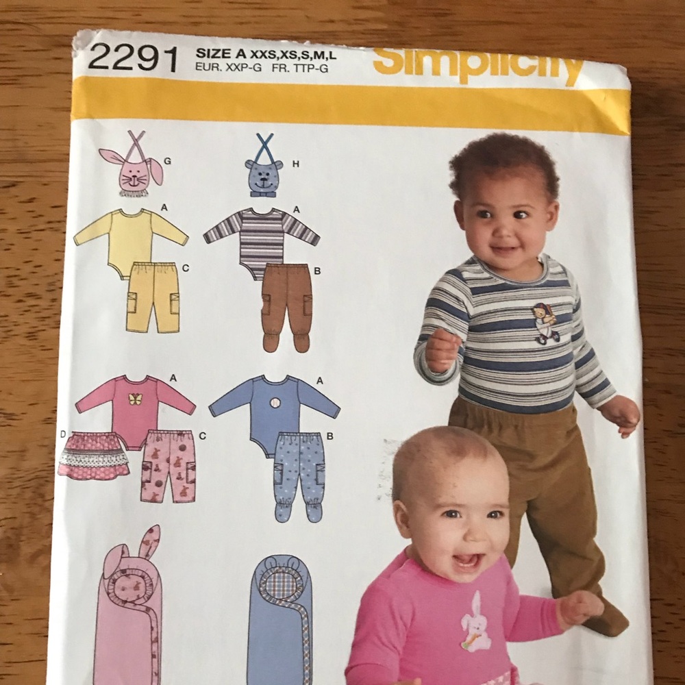 Uncut new simplicity 2291 baby clothing